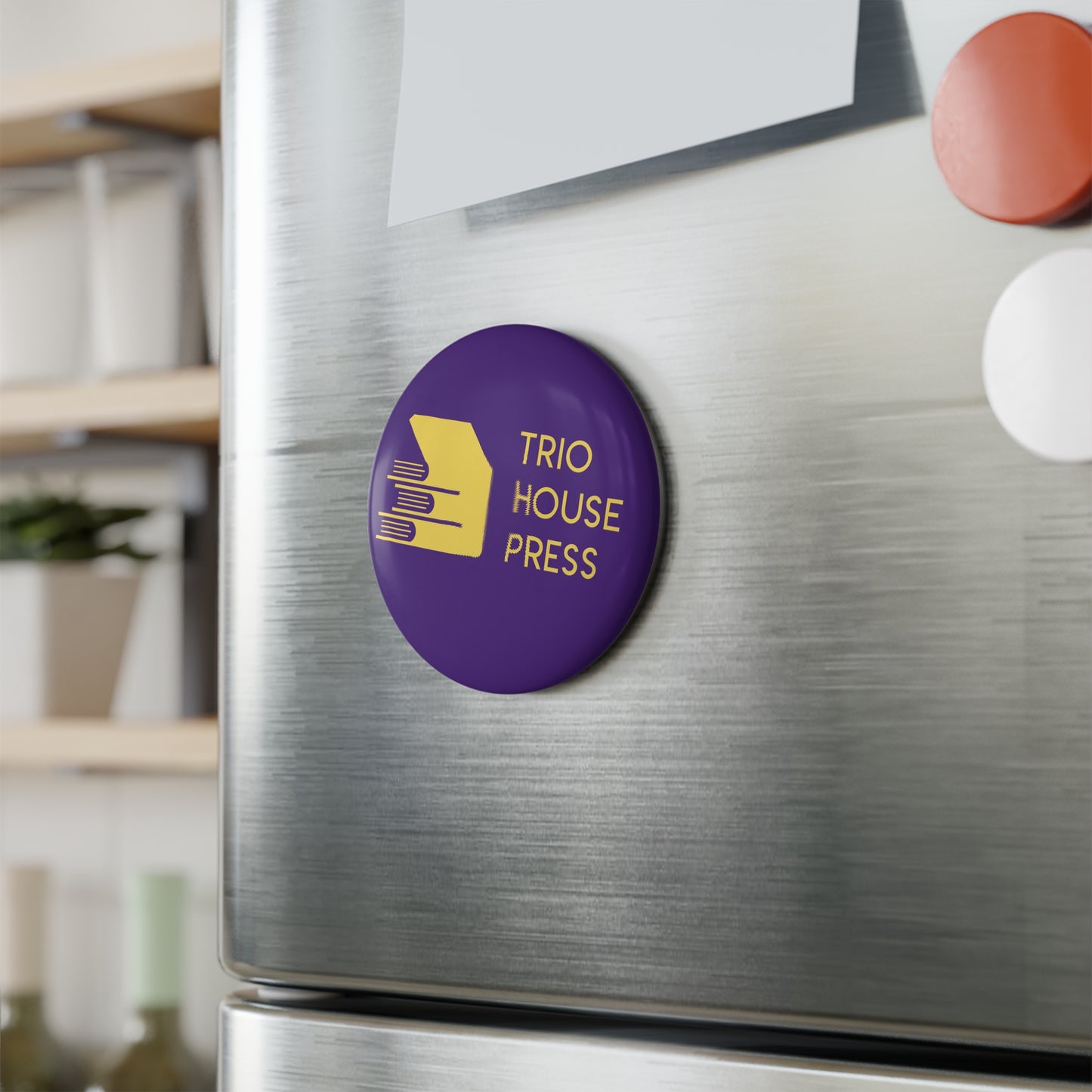 Trio House Press Round Button Magnet — Purple & Gold Logo Fridge Magnet